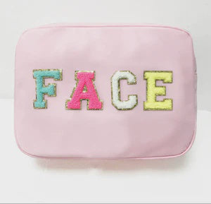 "FACE" lettered bag